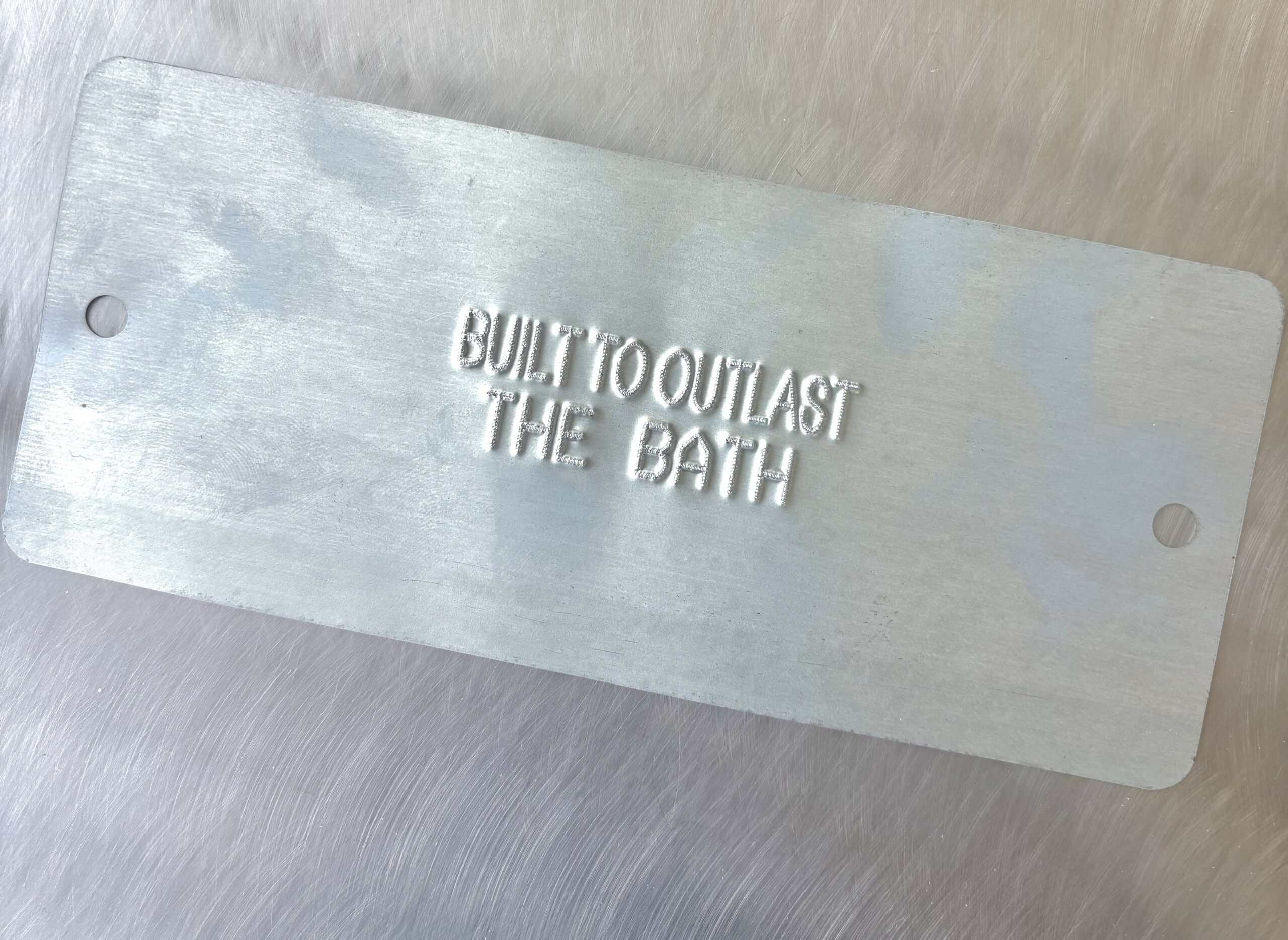 embossed tag for galvanizing
